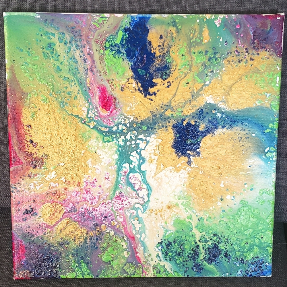 Abstract acrylic pour painting artwork on canvas